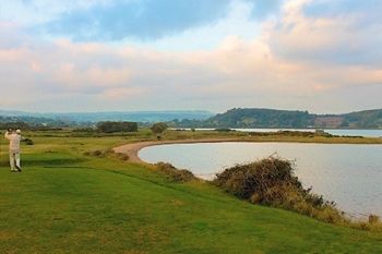 Day of Golf For Two (£28) or Four (£56) at Warren Golf Club (60% Off)