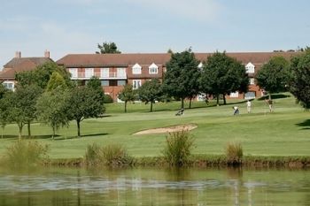 18 Holes of Golf With Bacon Roll and Coffee For Two or Four from £22 at Best Western Plus Windmill Village (52% Off)